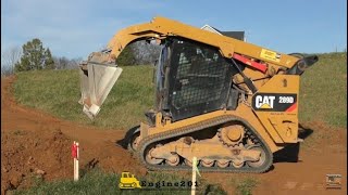 Caterpillar 289D Cutting in a Driveway [upl. by Rome]