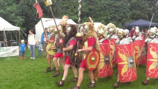 Roman Reenactment at the Amphitheatre in Caerleon Marching In [upl. by Ynamrej561]